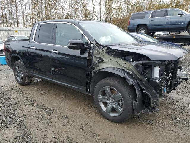 Photo 4 from auction – 2023 HONDA RIDGELINE with VIN 5FPYK3F77PB033955