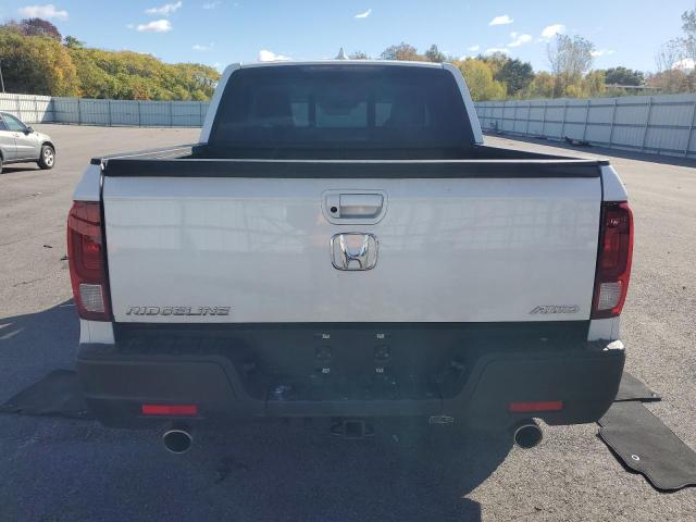 Photo 6 from auction – 2023 HONDA RIDGELINE with VIN 5FPYK3F59PB059293