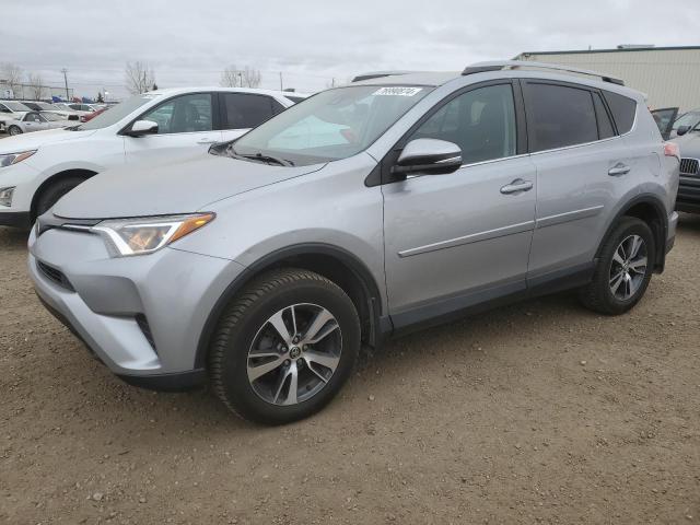 TOYOTA RAV4 LE 2018 with VIN 2T3BFREV0JW735090 - Photo from auction
