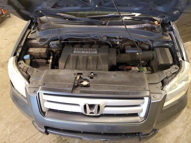 Photo 11 from auction – 2006 HONDA PILOT EX with VIN 5FNYF18766B011183