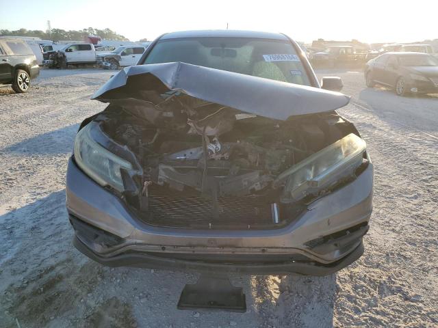 Photo 5 from auction – 2015 HONDA CR-V LX with VIN 3CZRM3H30FG714995