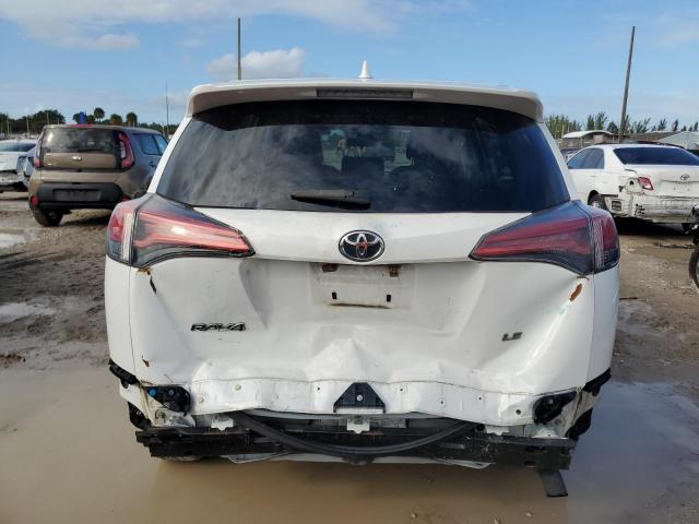 Photo 6 from auction – 2018 TOYOTA RAV4 LE with VIN 2T3ZFREV2JW443133