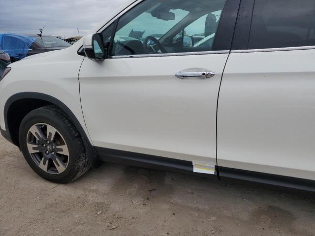 Photo 12 from auction – 2019 HONDA RIDGELINE with VIN 5FPYK3F77KB022138