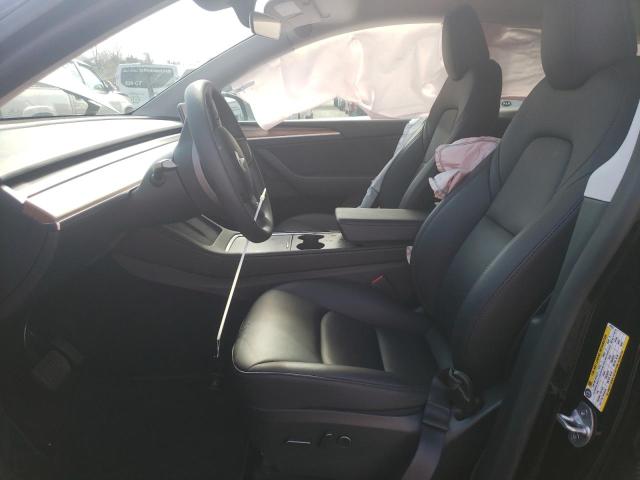 Photo 7 from auction – 2023 TESLA MODEL Y with VIN 7SAYGAEE2PF919117