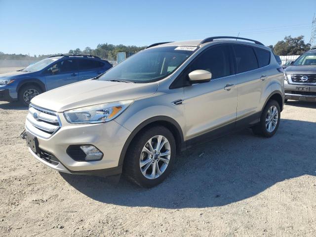 FORD ESCAPE SE 2018 with VIN 1FMCU0GD5JUC09847 - Photo from auction