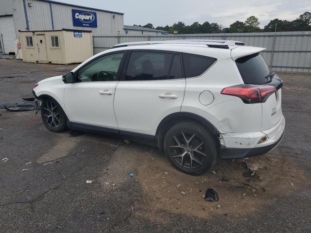 Photo 2 from auction – 2016 TOYOTA RAV4 SE with VIN JTMJFREV7GJ071079