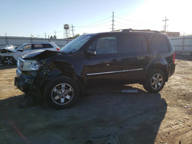 HONDA PILOT TOUR 2011 with VIN 5FNYF4H98BB092779 - Photo from auction