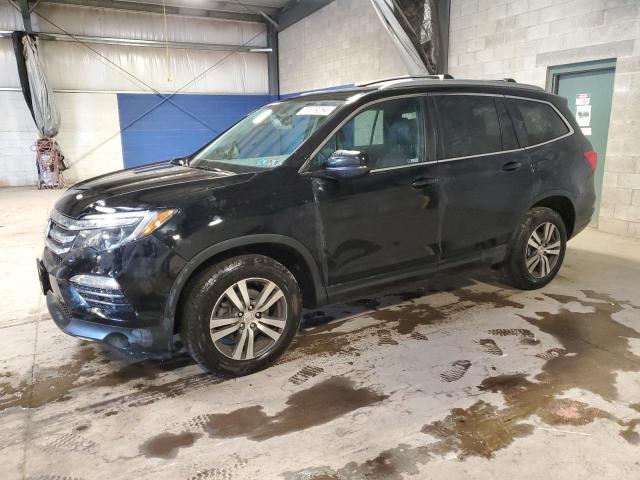 HONDA PILOT EXL 2018 with VIN 5FNYF6H55JB062095 - Photo from auction