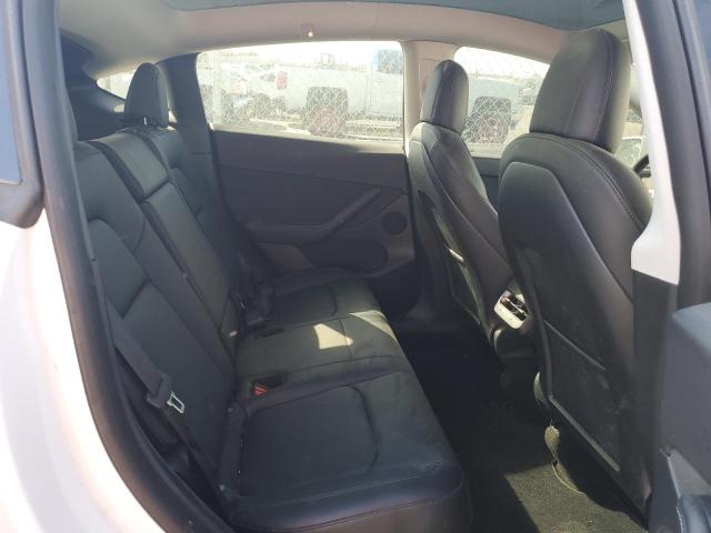 Photo 10 from auction – 2022 TESLA MODEL Y with VIN 7SAYGDEF6NF400031