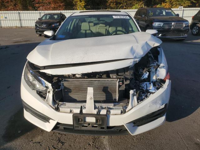 Photo 5 from auction – 2017 HONDA CIVIC EX with VIN 2HGFC2F70HH530804