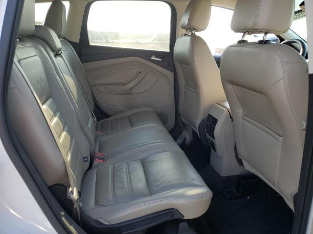 Photo 11 from auction – 2017 FORD ESCAPE TIT with VIN 1FMCU0J97HUA09843
