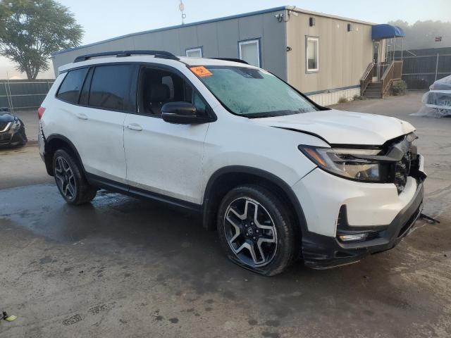Photo 4 from auction – 2022 HONDA PASSPORT E with VIN 5FNYF8H00NB009729