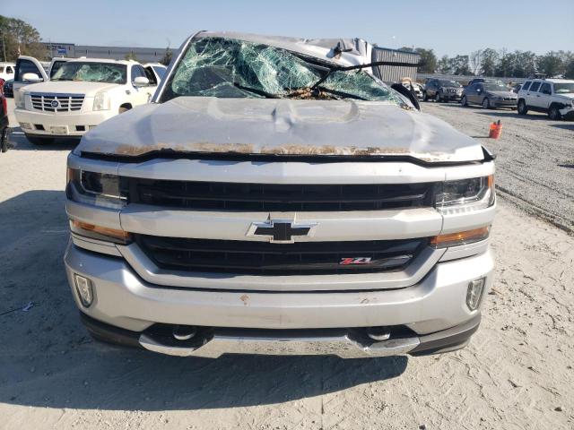Photo 5 from auction – 2018 CHEVROLET SILVERADO with VIN 3GCUKREC3JG260098