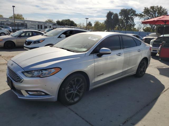 FORD FUSION SE 2018 with VIN 3FA6P0LU0JR169978 - Photo from auction