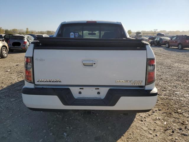 Photo 6 from auction – 2014 HONDA RIDGELINE with VIN 5FPYK1F59EB001735