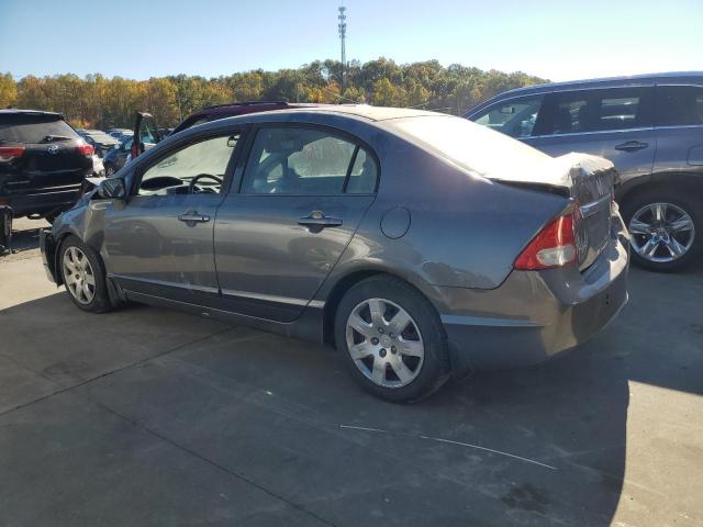 Photo 2 from auction – 2011 HONDA CIVIC LX with VIN 19XFA1F57BE036147