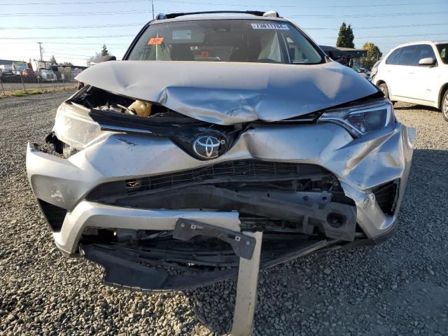 Photo 5 from auction – 2018 TOYOTA RAV4 LE with VIN JTMBFREV7JJ213541