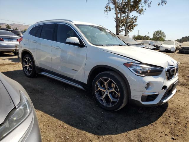 Photo 4 from auction – 2017 BMW X1 XDRIVE2 with VIN WBXHT3C36H5F87729