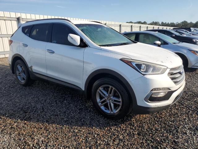 Photo 4 from auction – 2018 HYUNDAI SANTA FE S with VIN 5NMZU3LBXJH069547