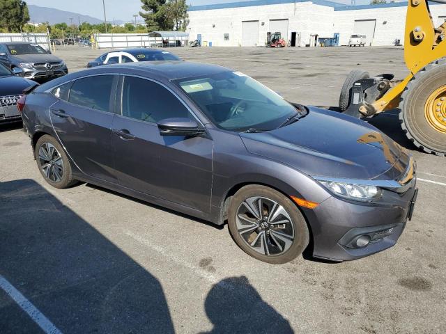 Photo 4 from auction – 2017 HONDA CIVIC EX with VIN 2HGFC1F31HH654281