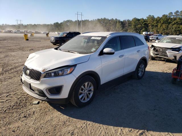 KIA SORENTO LX 2016 with VIN 5XYPG4A52GG104781 - Photo from auction