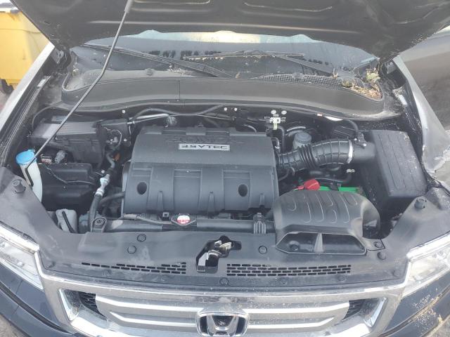 Photo 11 from auction – 2010 HONDA RIDGELINE with VIN 5FPYK1F58AB007262