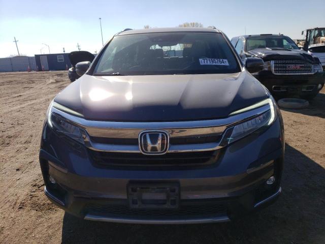 Photo 5 from auction – 2020 HONDA PILOT ELIT with VIN 5FNYF6H04LB025272