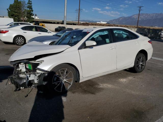 TOYOTA CAMRY LE 2017 with VIN 4T1BF1FK8HU746685 - Photo from auction