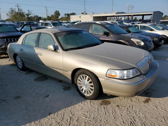 Photo 4 from auction – 2004 LINCOLN TOWN CAR E with VIN 1LNHM81W14Y684827