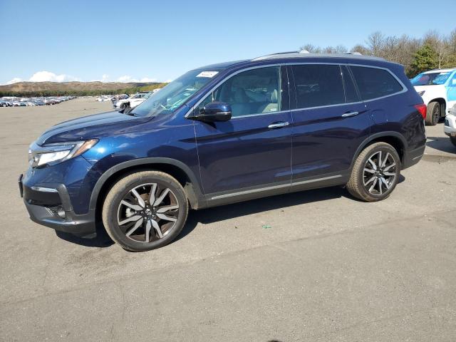 HONDA PILOT TOUR 2019 with VIN 5FNYF6H90KB045824 - Photo from auction