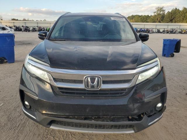 Photo 5 from auction – 2022 HONDA PILOT TOUR with VIN 5FNYF5H65NB022897