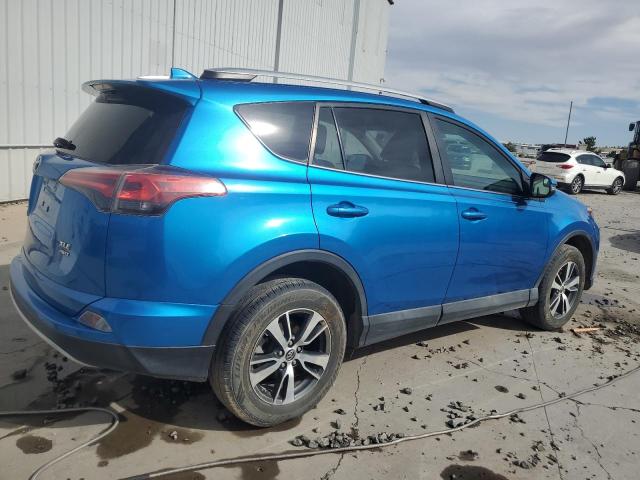 Photo 3 from auction – 2016 TOYOTA RAV4 XLE with VIN 2T3RFREV7GW433335