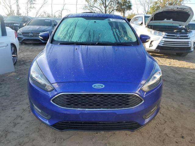 Foto 5 de la subasta – 2015 FORD FOCUS SE con VIN 1FADP3K21FL333415