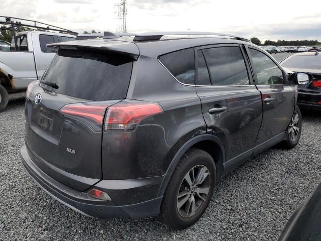 Photo 3 from auction – 2017 TOYOTA RAV4 XLE with VIN JTMWFREV6HJ146314