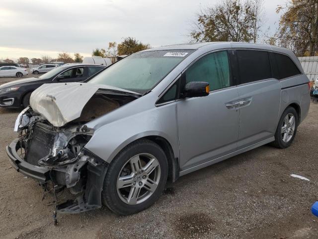 HONDA ODYSSEY TO 2012 with VIN 5FNRL5H91CB504593 - Photo from auction
