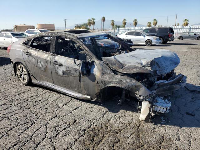 Photo 4 from auction – 2016 HONDA CIVIC EX with VIN 2HGFC1F30GH642945