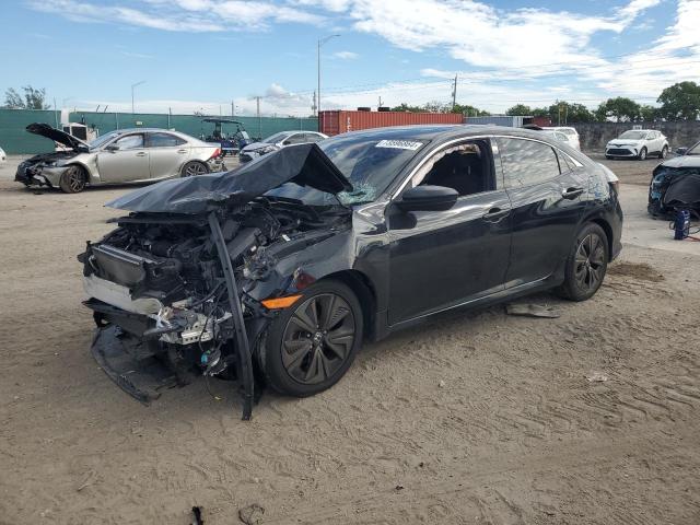 HONDA CIVIC EX 2018 with VIN SHHFK7H54JU224869 - Photo from auction