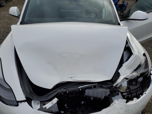 Photo 11 from auction – 2023 TESLA MODEL 3 with VIN 5YJ3E1EA7PF550474
