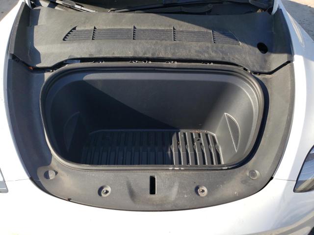 Photo 12 from auction – 2022 TESLA MODEL Y with VIN 7SAYGDEE5NA017105