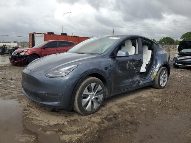 TESLA MODEL Y 2023 with VIN 7SAYGDEE8PF854503 - Photo from auction
