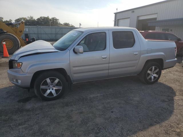 HONDA RIDGELINE 2014 with VIN 5FPYK1F67EB011723 - Photo from auction
