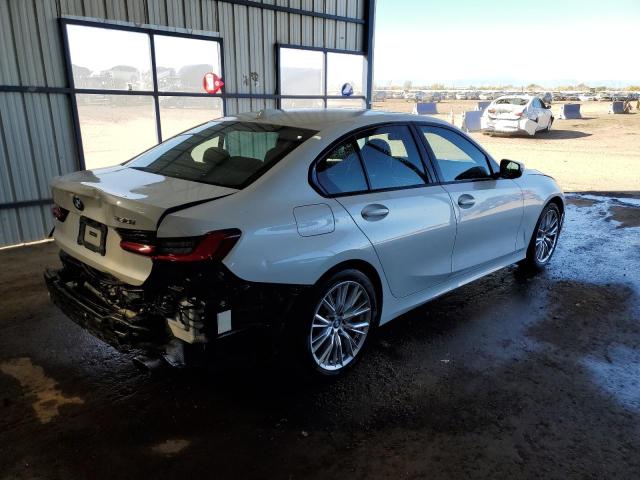 Photo 3 from auction – 2023 BMW 330I with VIN 3MW69FF06P8D56606