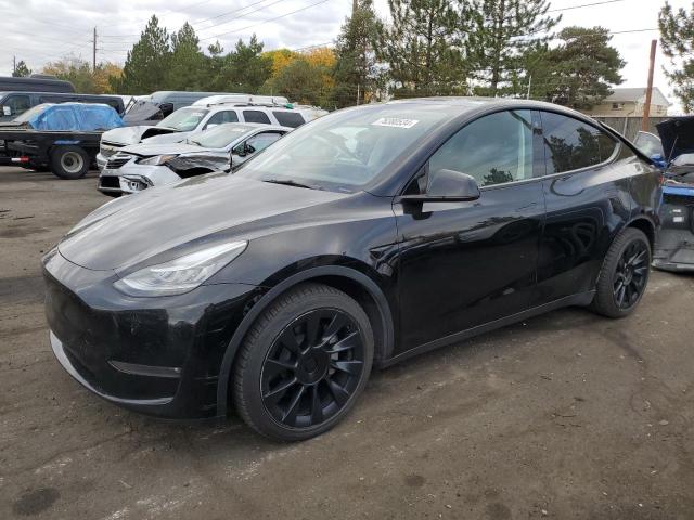TESLA MODEL Y 2022 with VIN 7SAYGAEE7NF573563 - Photo from auction