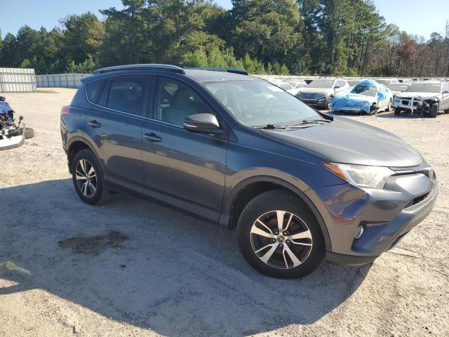 Photo 4 from auction – 2017 TOYOTA RAV4 XLE with VIN JTMRFREV0HD213436