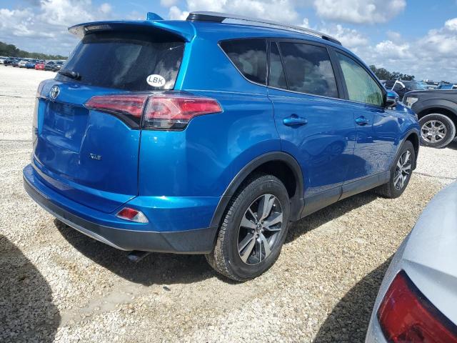 Photo 3 from auction – 2017 TOYOTA RAV4 XLE with VIN JTMWFREV9HJ714362