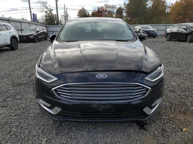 Photo 5 from auction – 2018 FORD FUSION TIT with VIN 3FA6P0D93JR137262