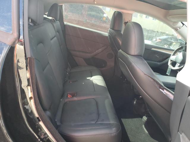 Photo 10 from auction – 2023 TESLA MODEL Y with VIN 7SAYGDEE2PA102812