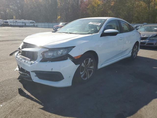 HONDA CIVIC LX 2018 with VIN 2HGFC2F54JH603760 - Photo from auction