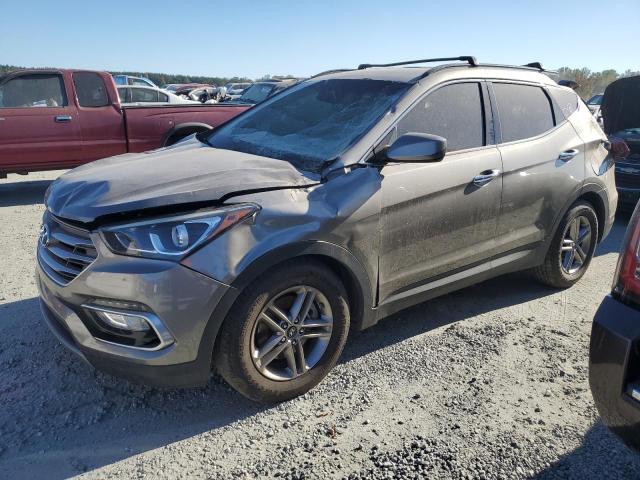HYUNDAI SANTA FE S 2017 with VIN 5NMZU3LB0HH002871 - Photo from auction