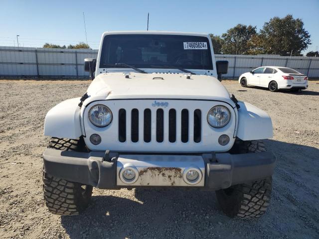 Photo 5 from auction – 2015 JEEP WRANGLER U with VIN 1C4BJWEGXFL691026